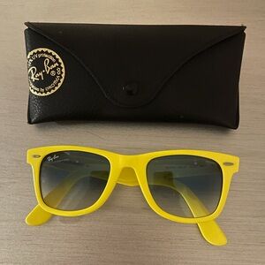 yellow Ray-Ban wayfarer sunglasses